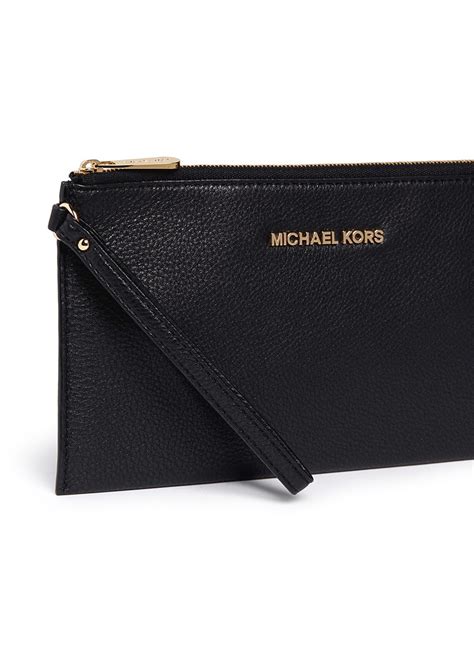 michael kors iphone clutch black|michael kors clutch handbags.